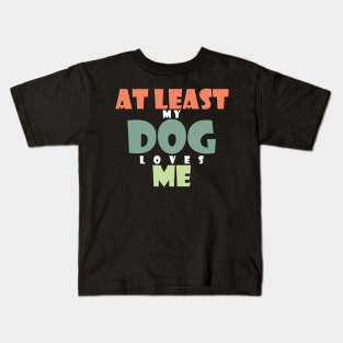 At least my dog loves me Kids T-Shirt